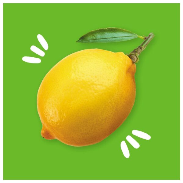 A whole yellow lemon with a green leaf on a bright green background.