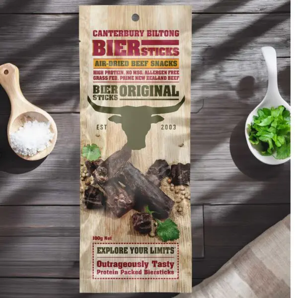 Packaging of Canterbury Biltong Biersticks Original, featuring air-dried beef snacks with various ingredients listed.
