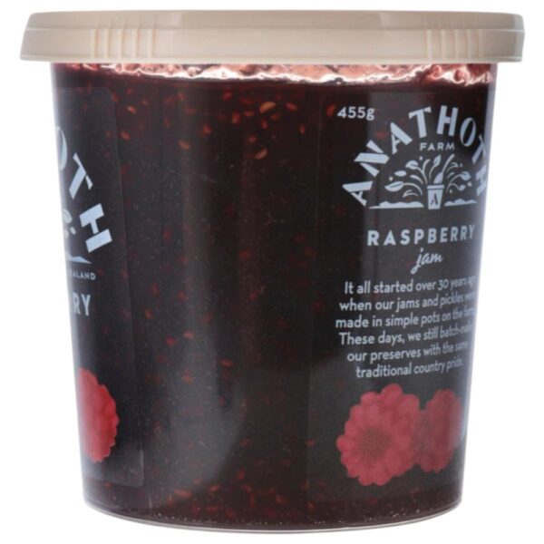 Pot of Anathoth Farm raspberry jam with a clear lid and label detailing the product.