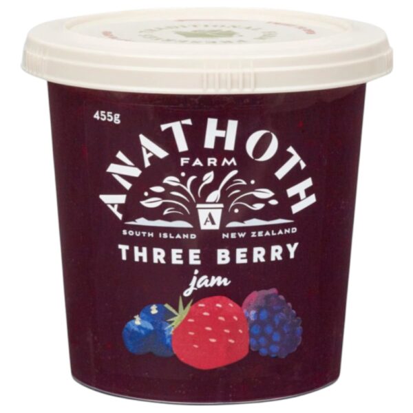 Pot of Anathoth Farm Three Berry Jam with a label featuring strawberries, raspberries, and blueberries.