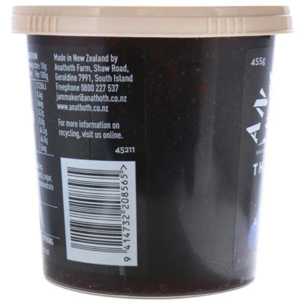 Pot of Anathoth Farm Three Berry Jam with a beige lid and product information on the side.