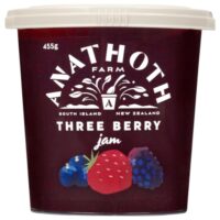 Pot of Anathoth Farm Three Berry Jam featuring strawberries, blueberries, and blackberries.
