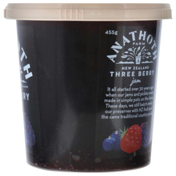 Pot of Anathoth Farm Three Berry Jam with a lid, featuring blackcurrants, raspberries, and blueberries.