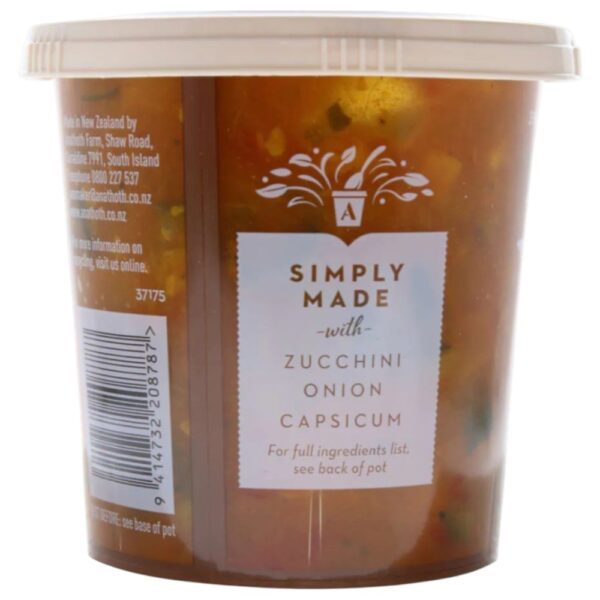 Tub of Anathoth Farm zucchini pickle with a clear lid and label detailing ingredients.