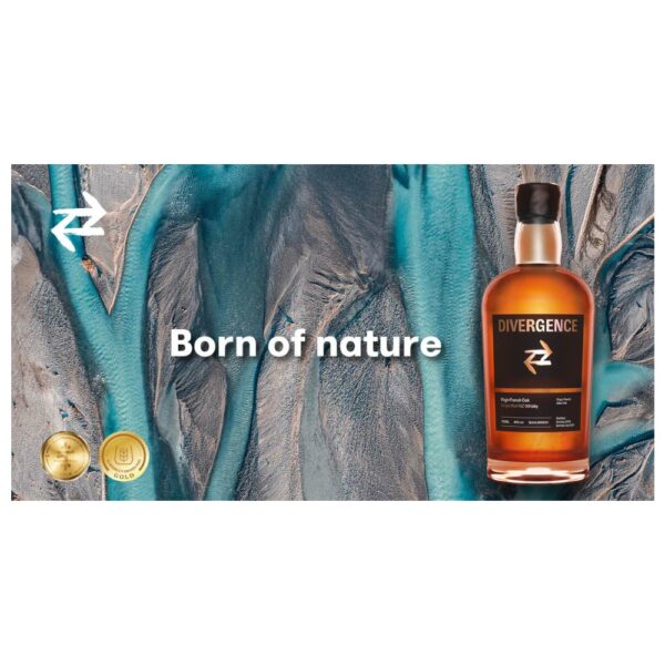 Bottle of Divergence Single Malt Whisky from New Zealand with a textured background.
