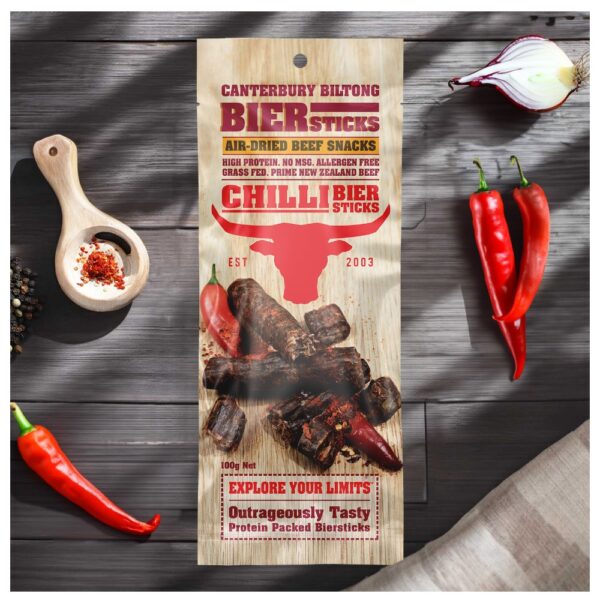 Packaging of Canterbury Biltong Chilli Biersticks featuring beef snacks and red chillies.