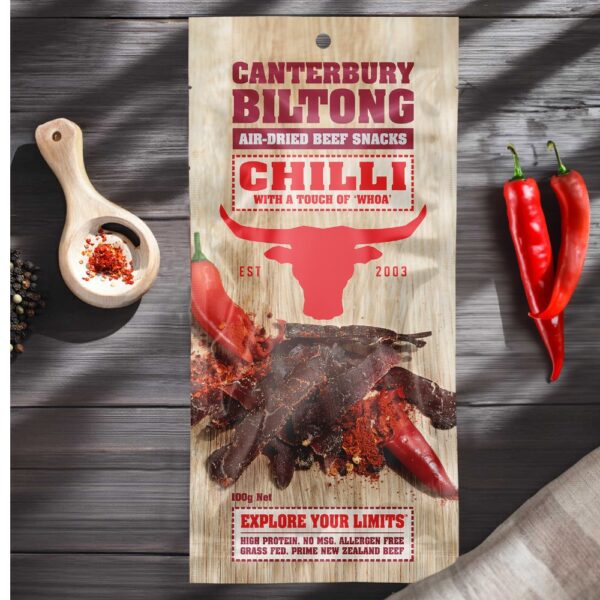 Packaging of Canterbury Biltong air-dried beef snacks with chilli flavour and a bull logo.