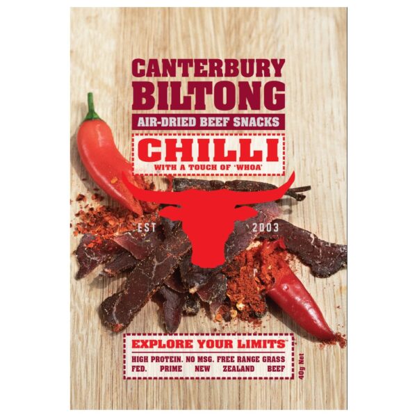 Packaging of Canterbury Biltong air-dried beef snacks with chilli flavour, featuring a red bull logo.