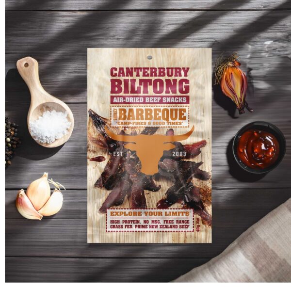 Packaging for Canterbury Biltong air-dried beef snacks featuring a barbecue theme and a bull graphic.