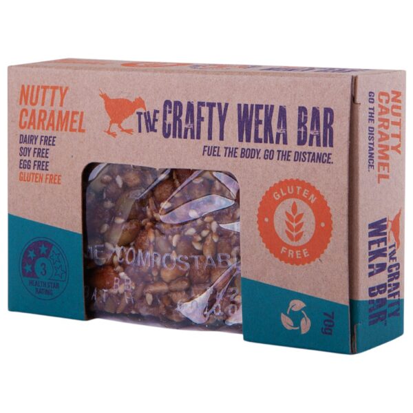 Packaged gluten-free nutty caramel bar from The Crafty Weka brand, featuring a clear view of the product inside.
