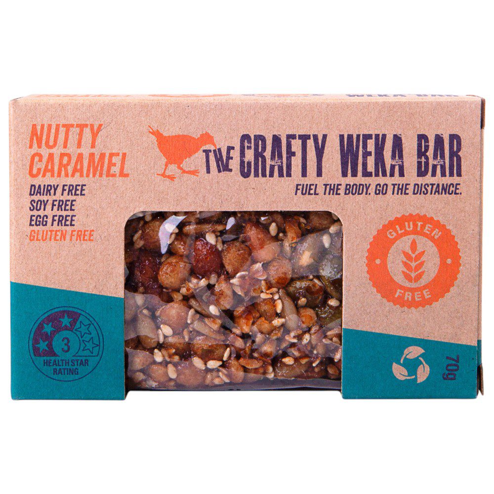 Packaged gluten-free nutty caramel bar with a cardboard box design and nutritional information.