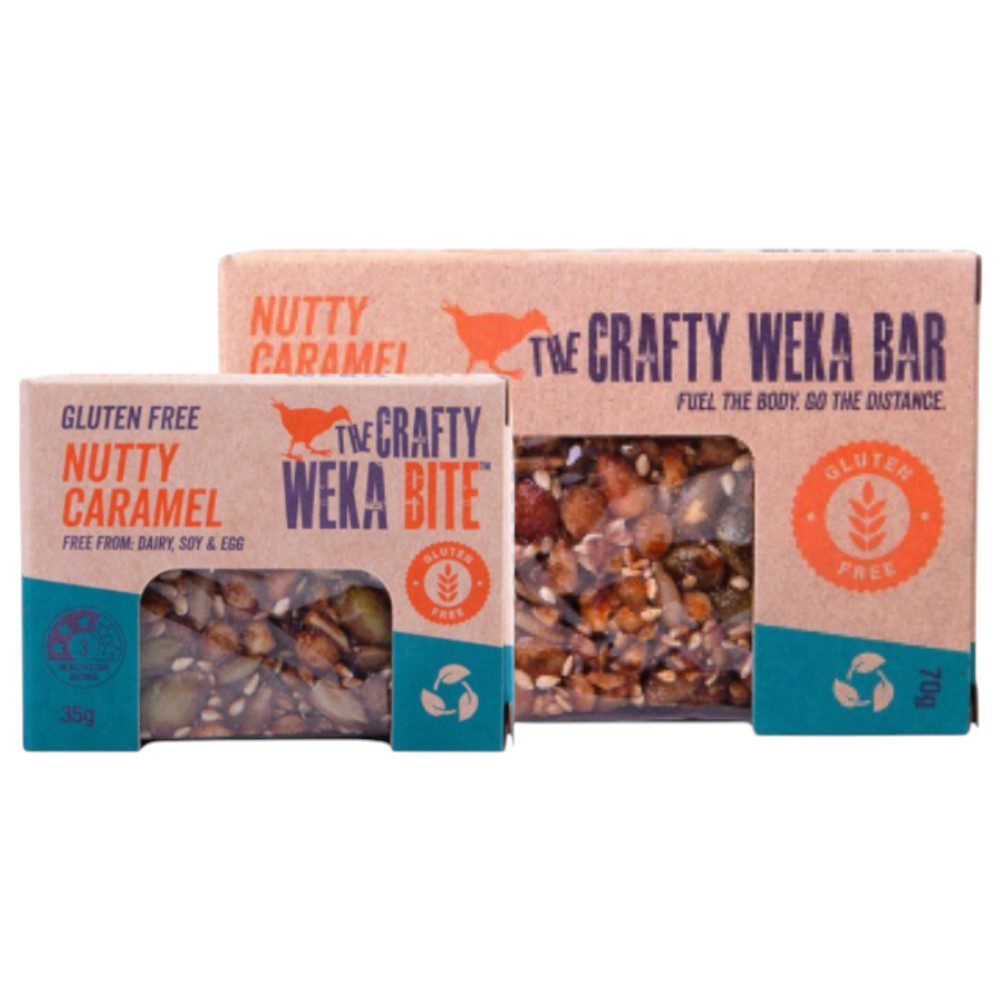 Two packages of The Crafty Weka gluten free nutty caramel snacks, one small and one larger.