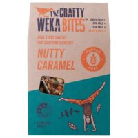 Packaged gluten-free nutty caramel bar with a cartoon figure performing a handstand on the front.