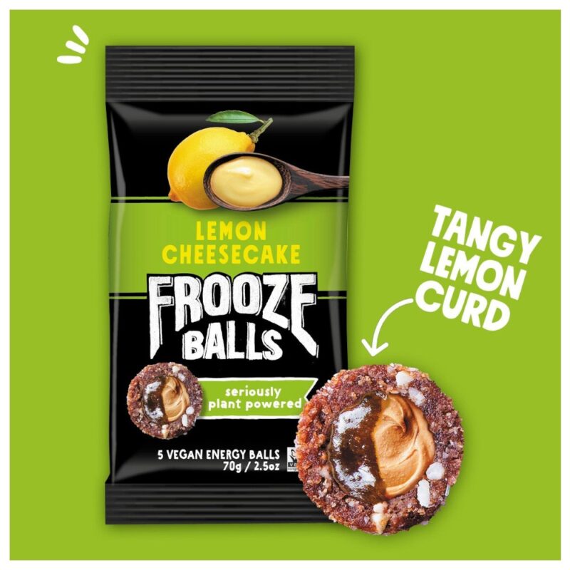 Packaging of Frooze Balls Lemon Cheesecake energy snack with a lemon and a ball featuring lemon curd.