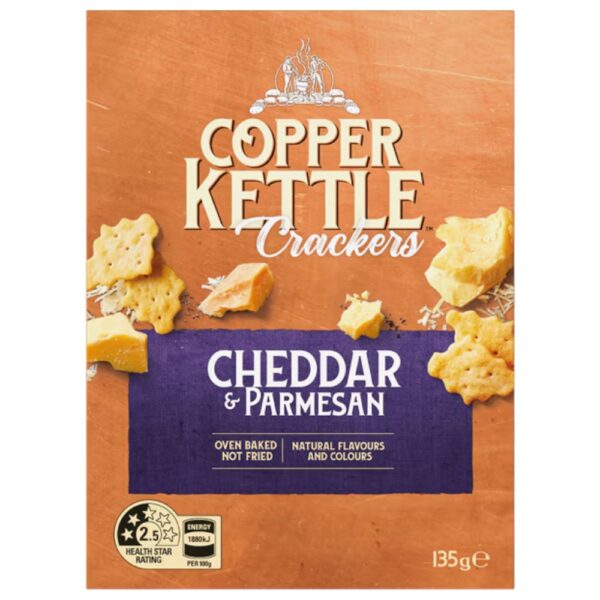 Packaged Copper Kettle crackers featuring cheddar and parmesan flavours, weighing 135 grams.