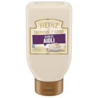 Bottle of Heinz Seriously Garlic Aioli with a beige label and brown cap, containing 295ml.
