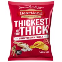 Red packaging of Heartland Thickest of the Thick Southern Salt potato chips, featuring a scoop of salt and chips.